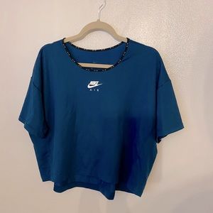 Dark teal/blue crop mesh top